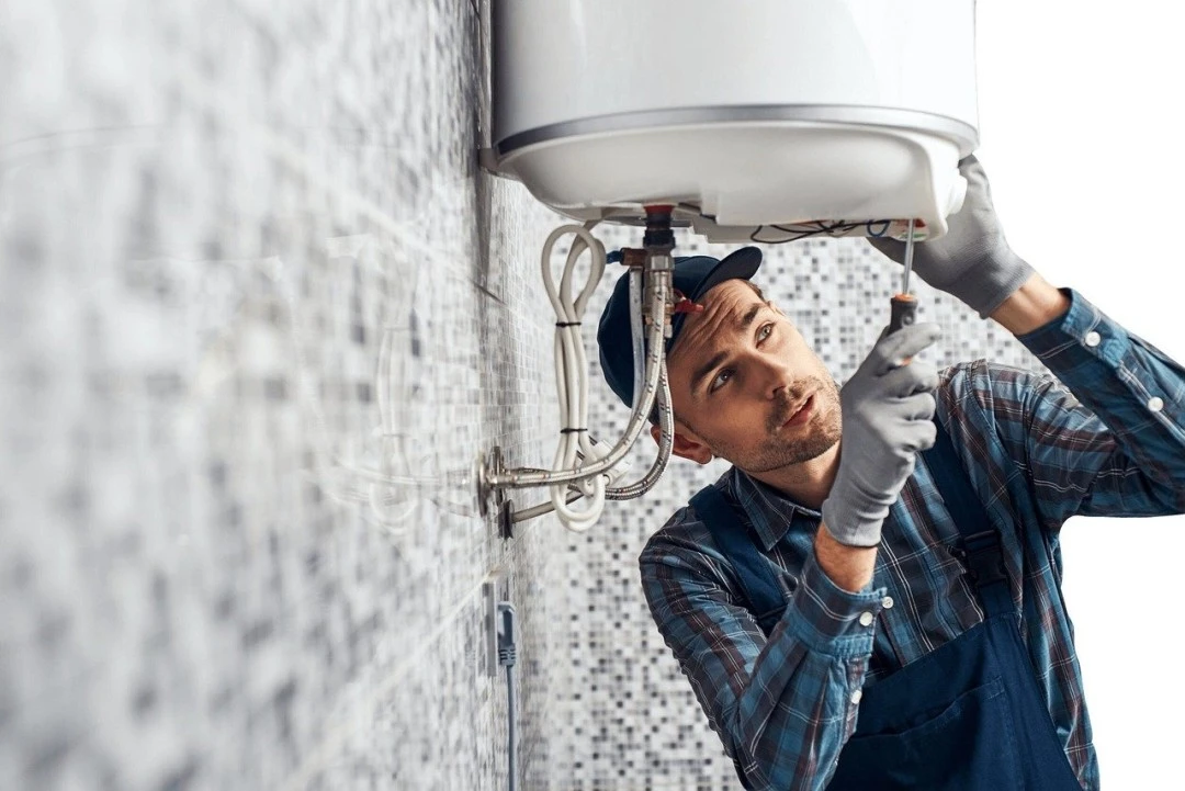 Plumber Fixing Sink